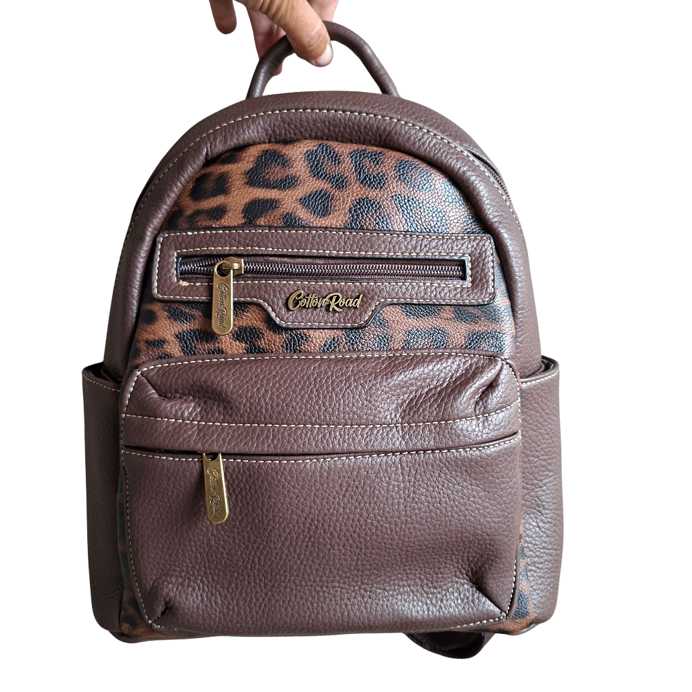 COTTON ROAD BACKPACK: COFFEE BROWN PU Leather Dome BackPack with Leopard Print in hand