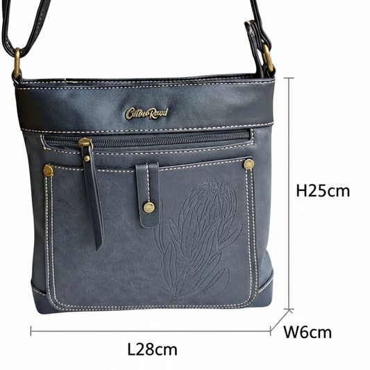 Cotton Road Sling Bag: BLACK PU Leather with Embossed Protea size