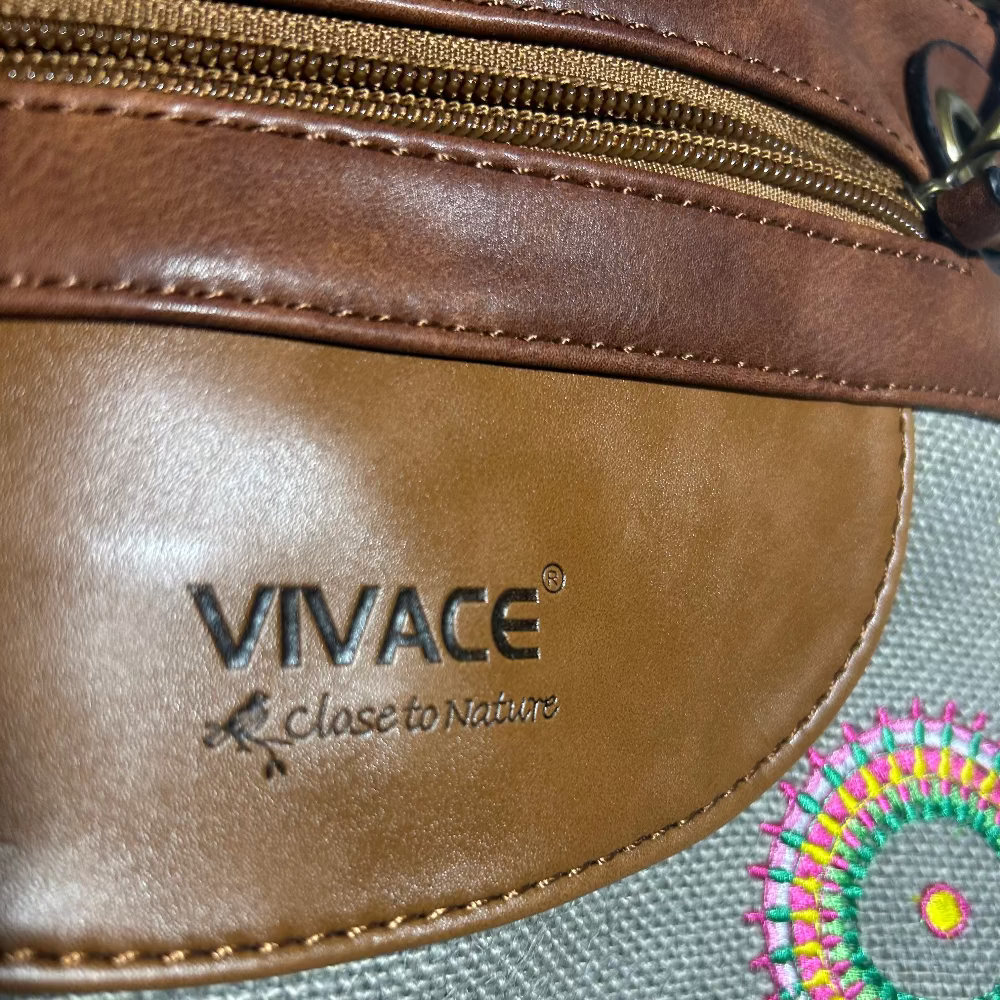Vivace Sling Bag: GREY Hessian and Leather bag with Embroidery FRONT BRANDING