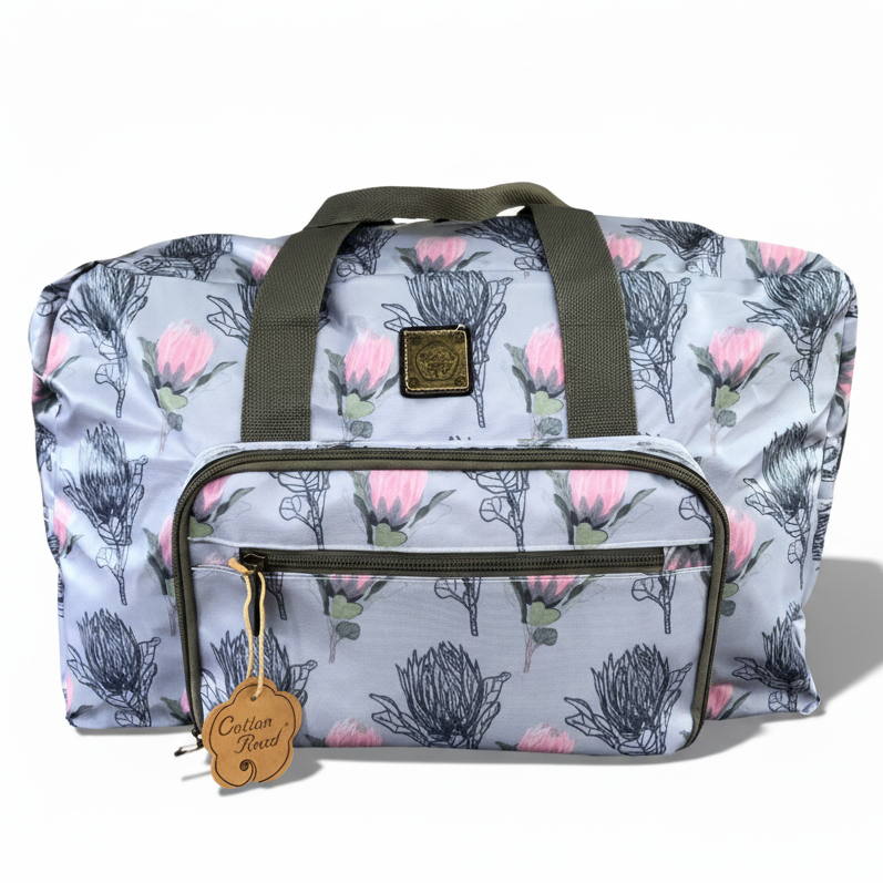 Cotton Road Travel Bag: Blue PVC Foldaway WEEKENDER Bag with PROTEAS UNFOLDED