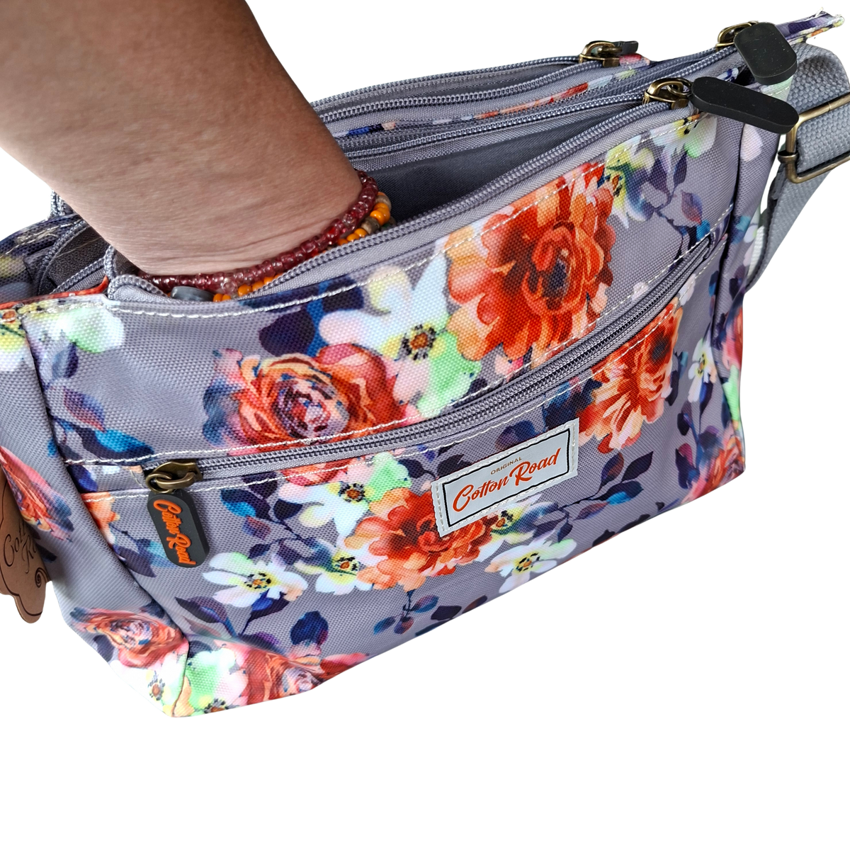 Cotton Road Sling Bag: GREY PVC Triple Pocket Sling with Bright Floral Print