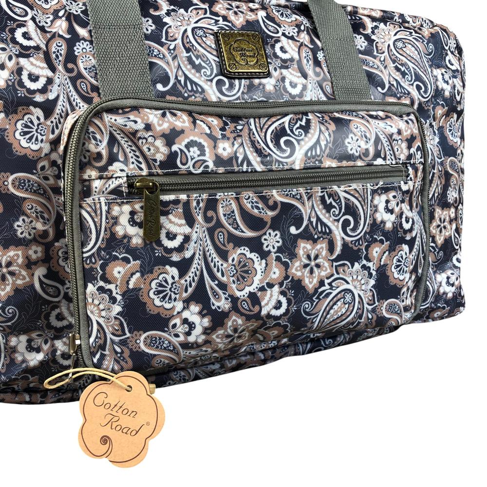Blue PVC foldaway travel bag with paisley print and front zip pocket by Cotton Road
