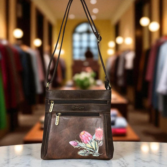 BROWN PU Leather Cotton Road Sling Bag with PROTEA detailing