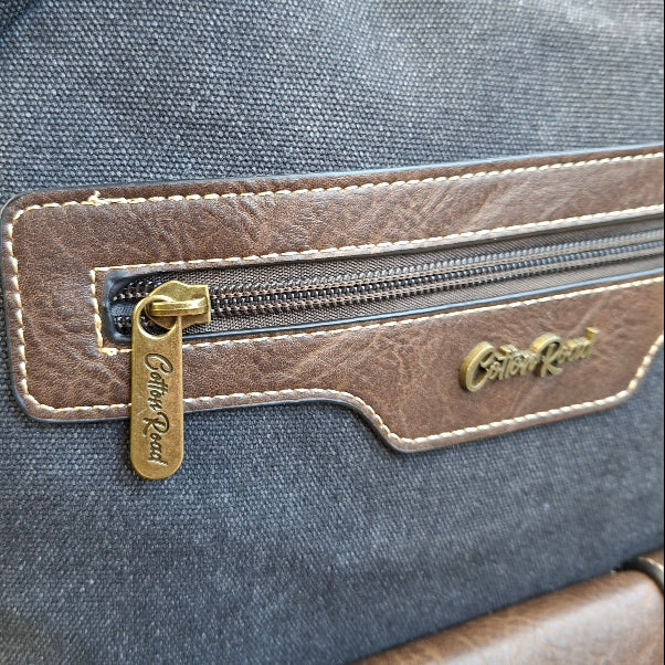 COTTON ROAD BACKPACK: BLACK Canvas and Pu Leather Travel Backpack BRANDING DETAIL