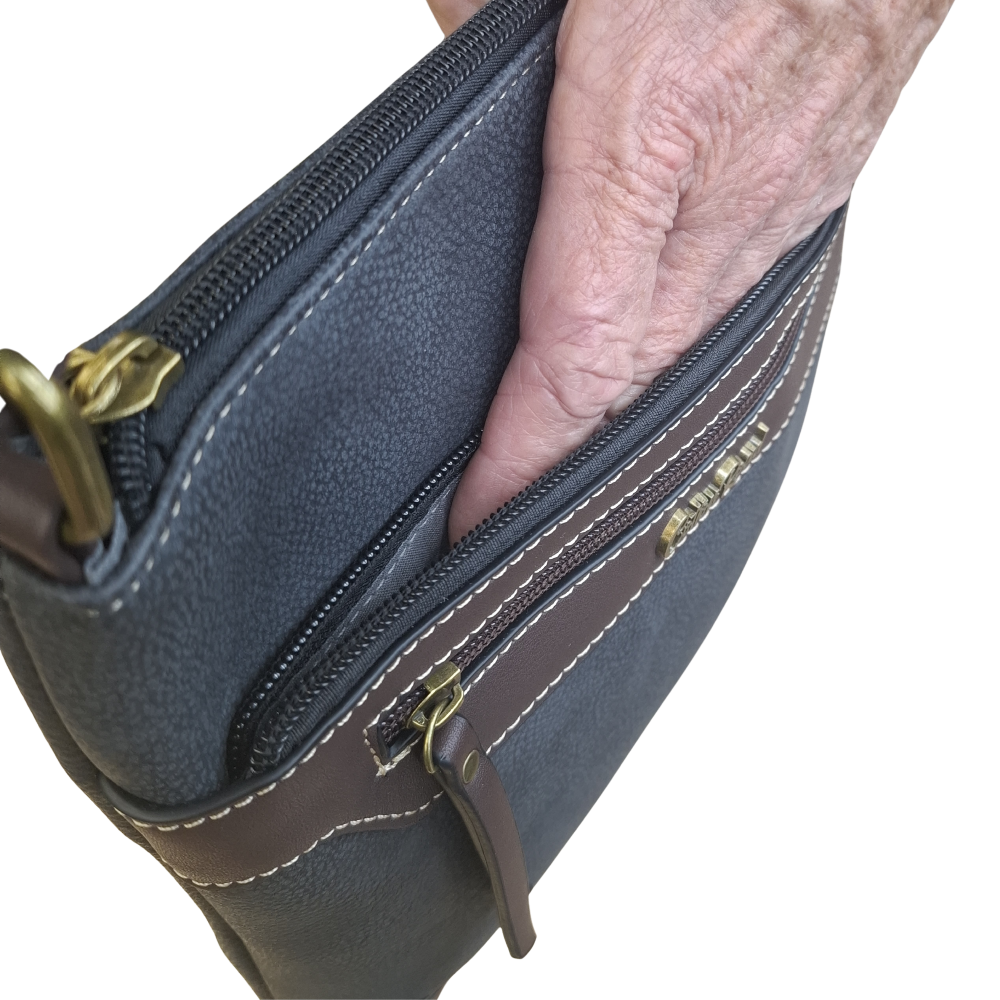 COTTON ROAD SLING BAG: BLACK Soft PU Leather CROSSBODY with BROWN IN HAND