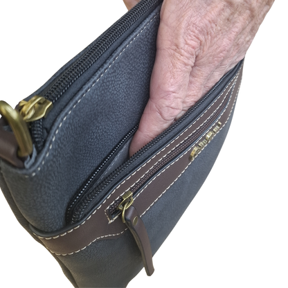COTTON ROAD SLING BAG: BLACK Soft PU Leather CROSSBODY with BROWN IN HAND