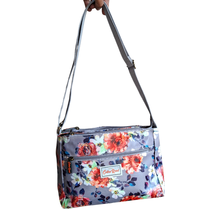 COTTON ROAD SLING BAG: GREY PVC Triple pocket Sling with Colourful floral print