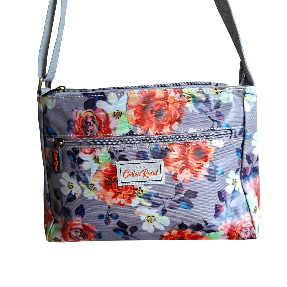 COTTON ROAD SLING BAG: GREY PVC Triple pocket Sling with Colourful floral print FRONT