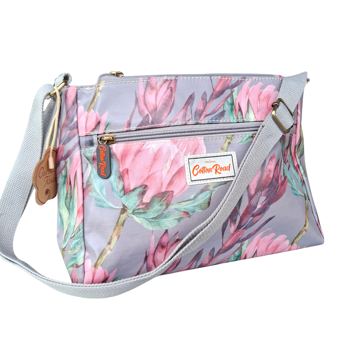 COTTON ROAD SLING BAG: GREY PVC Triple pocket Sling with Protea print