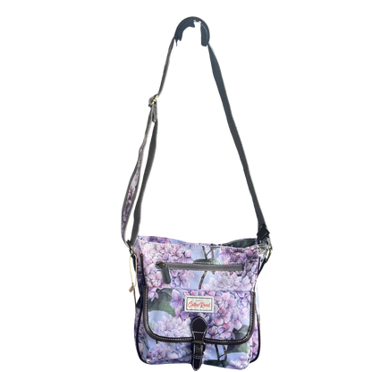 COTTON ROAD SLING BAG: LIGHT BLUE FLORAL PVC SLING BAG ON SLING