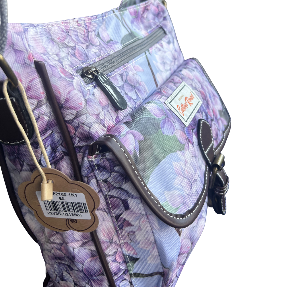 COTTON ROAD SLING BAG: LIGHT BLUE FLORAL PVC SLING BAG POCKETS