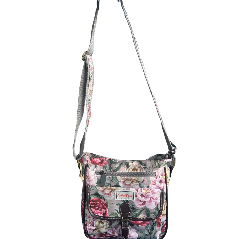 COTTON ROAD SLING BAG: MAUVE FLORAL PRINT PVC SLING BAG HANGING