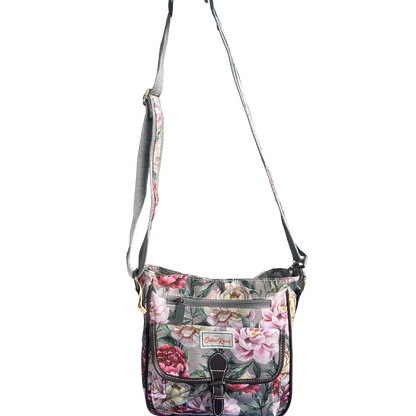 COTTON ROAD SLING BAG: MAUVE FLORAL PRINT PVC SLING BAG HANGING