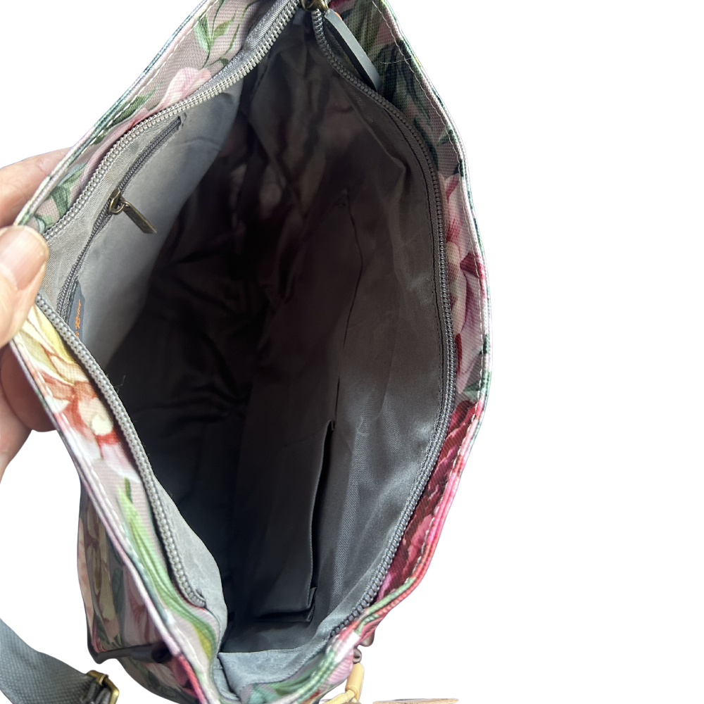 COTTON ROAD SLING BAG: MAUVE FLORAL PRINT PVC SLING BAG OPEN