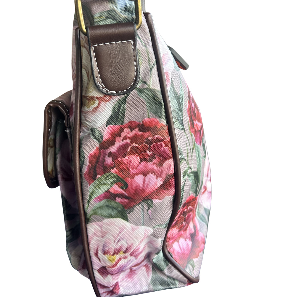 COTTON ROAD SLING BAG: MAUVE FLORAL PRINT PVC SLING BAG SIDE VIEW