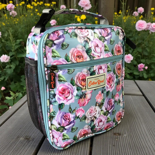 Cotton Road Cooler: BLUE PVC Cotton Road Lunch Box Cooler Bag outside view with ROSES