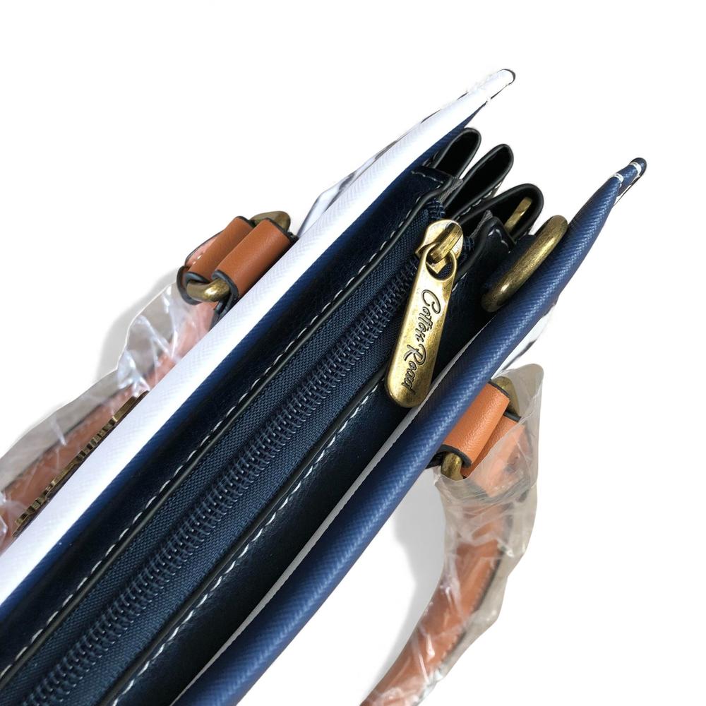 Cotton Road Handbag: NAVY and WHITE STRIPED PVC Handbag with TAN Handles
