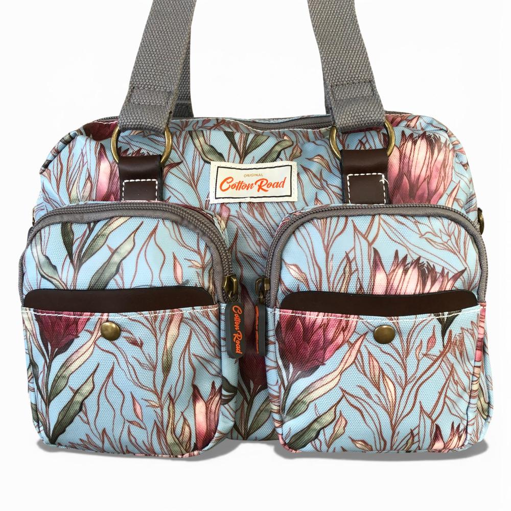 Cotton Road Handbag: TURQUOISE PVC Handbag with PROTEAS