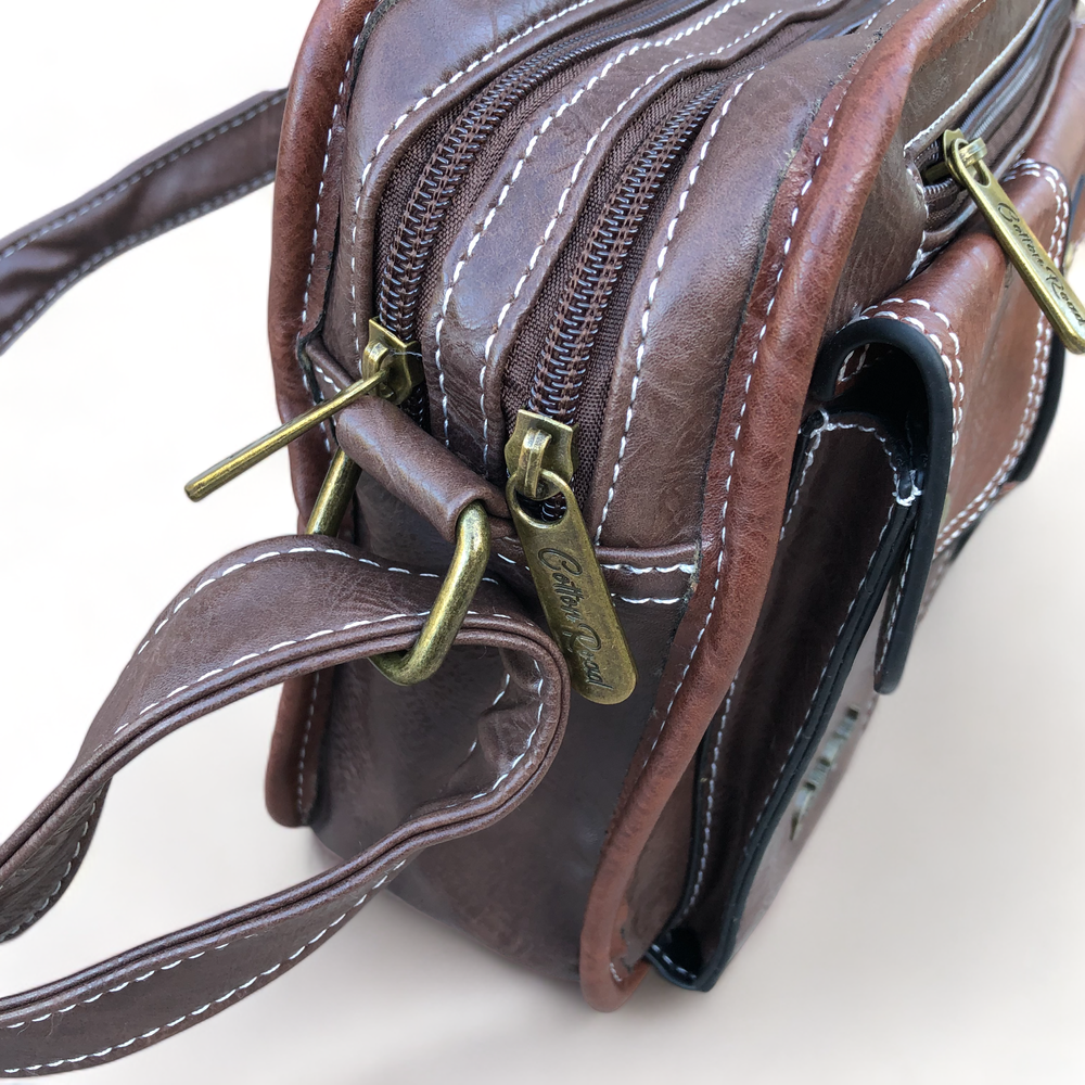 Cotton Road Sling Bag: BROWN PU Leather with Buckle detailing