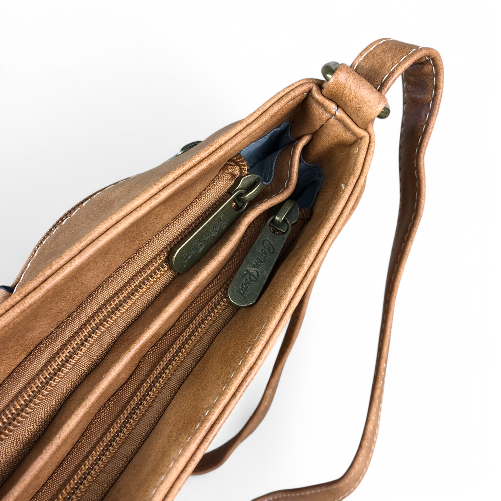 Cotton Road Sling Bag: KHAKI PU Leather Sling Bag with STRAP detailing. Two upper zip compartments 