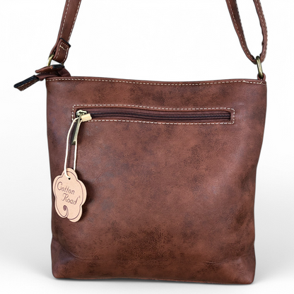 Cotton Road Sling Bag: TAN BROWN PU Leather Sling Bag with STRAP detailing. One back zip compartment
