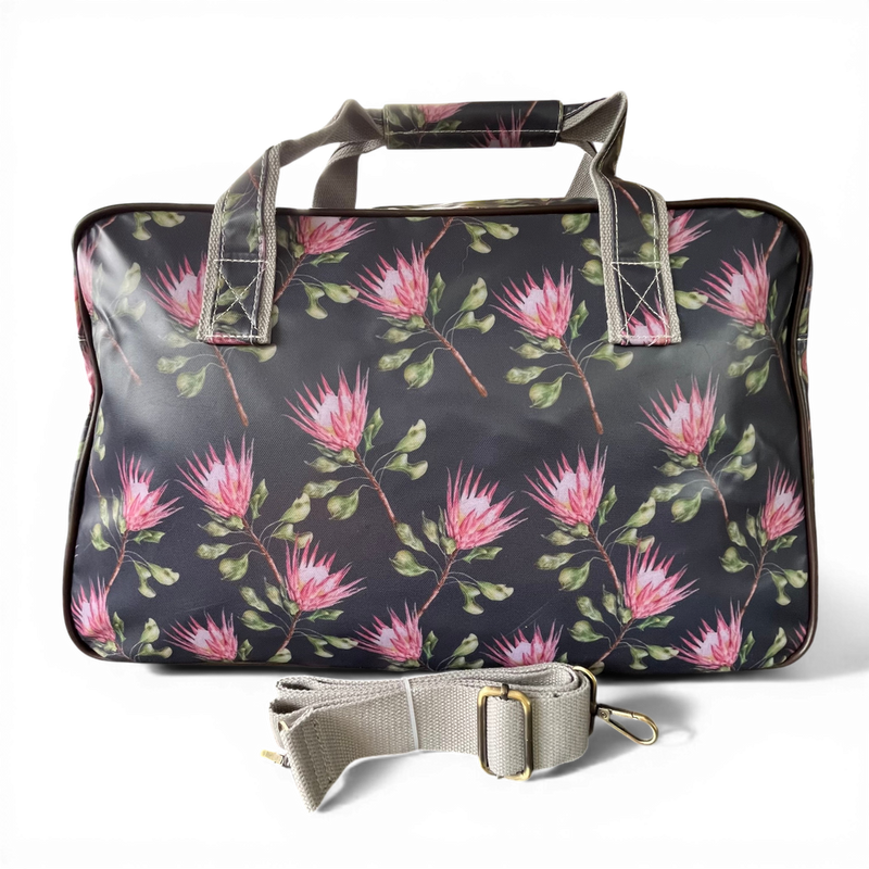 Cotton Road Travel Bag: BLACK PVC Overnight Bag with PROTEAS BACK
