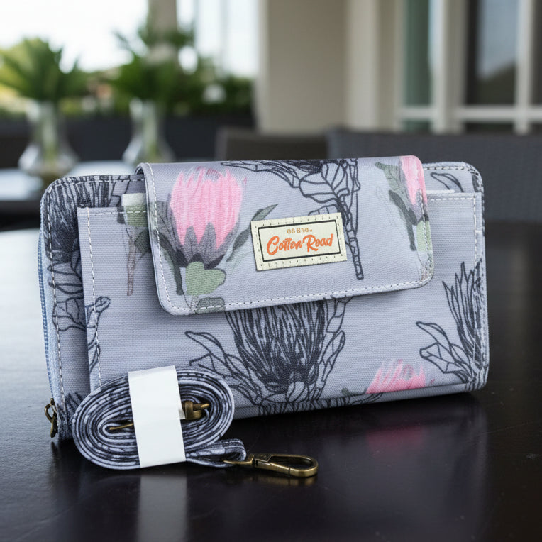 Cotton Road Wallet: Large BLUE PVC Cellphone Sling Wallet with PROTEA Design