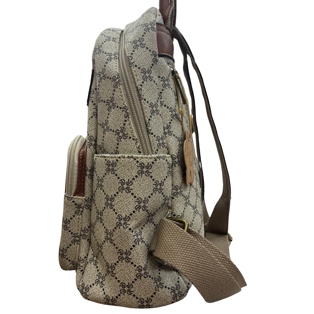 Cotton Road Backpack: Ivory beige PVC with Brown PU Leather trim and detailing SIDE VIEW