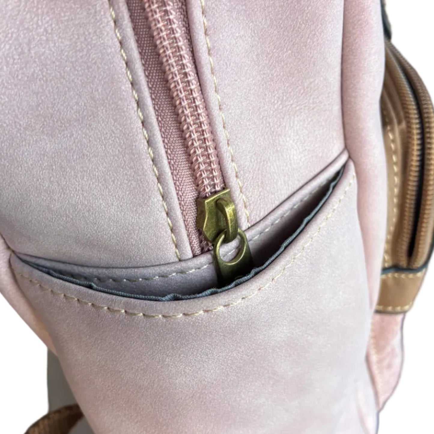 Cotton Road Backpack: PINK Suede-Style PU Leather with Embossed Print SIDE POCKET VIEW