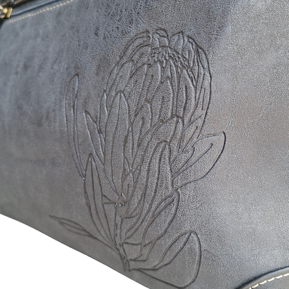 Cotton Road Handbag: BLACK PU Leather Double Compartment Handbag with EMBOSSED Protea DETAIL