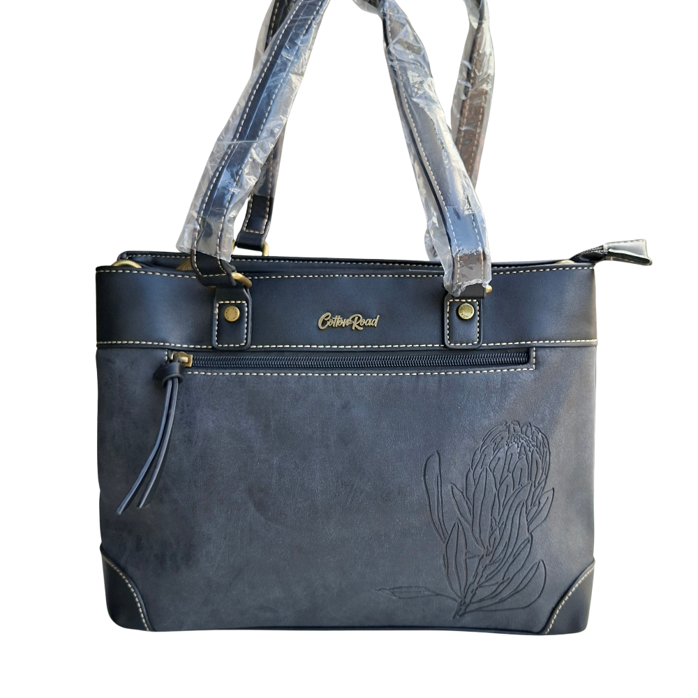 Cotton Road Handbag: BLACK PU Leather Double Compartment Handbag with EMBOSSED Protea FRONT