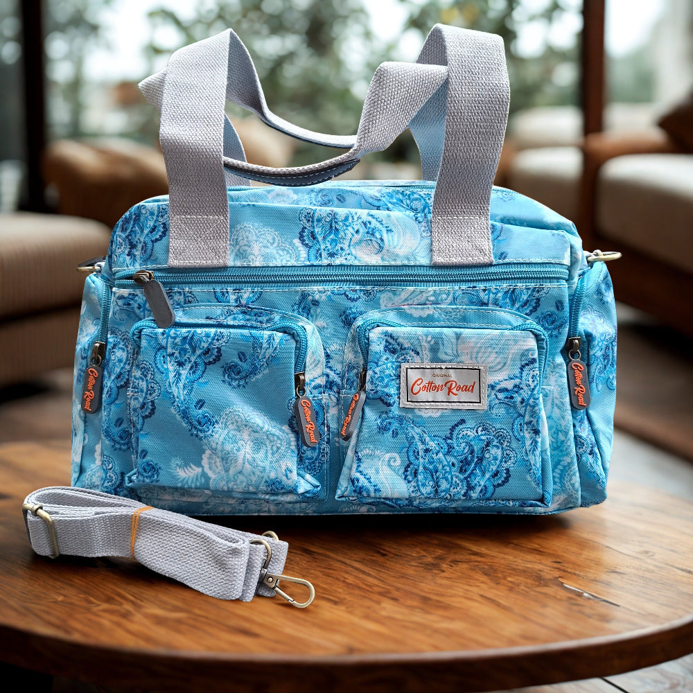 Cotton Road Handbag: BLUE PVC with PAISLEY Print