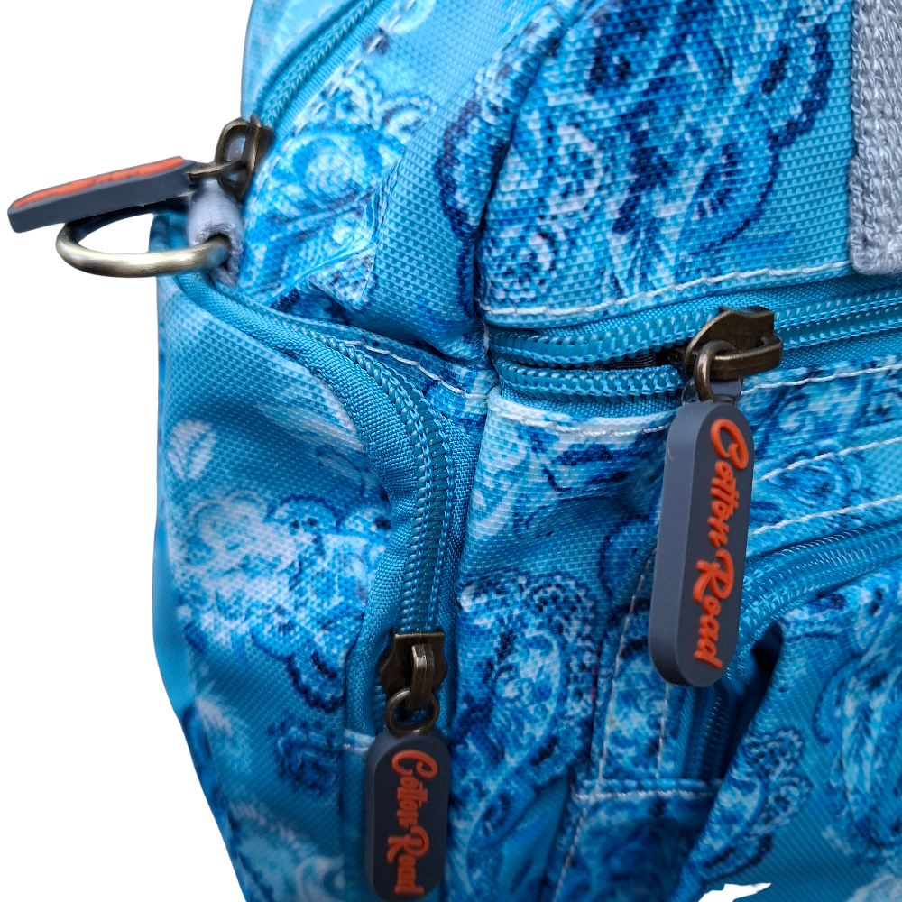 Cotton Road Handbag: BLUE PVC with PAISLEY Print SDE POCKET VIEW