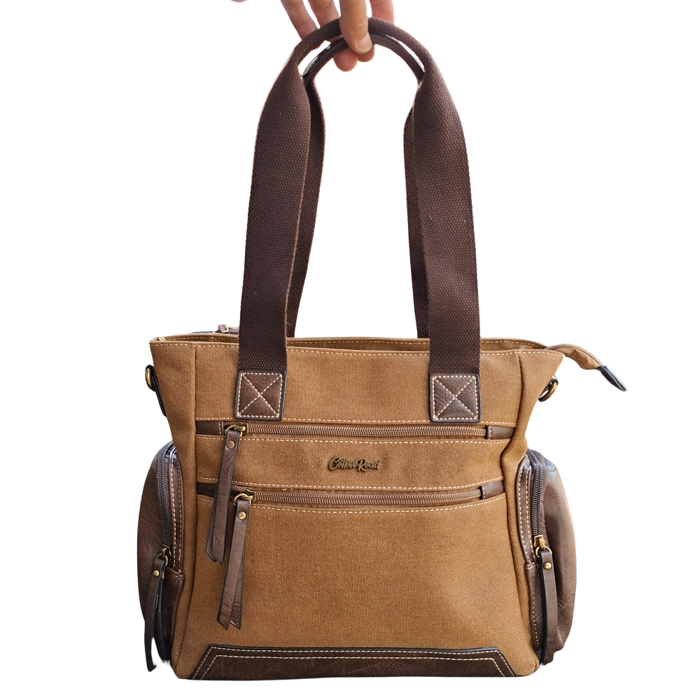 Cotton Road Handbag: BROWN Canvas & PU Leather Multi-pocket Shoulder Bag in hand