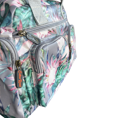 Cotton Road Handbag: GREY PVC Handbag with PROTEA PRINT side view
