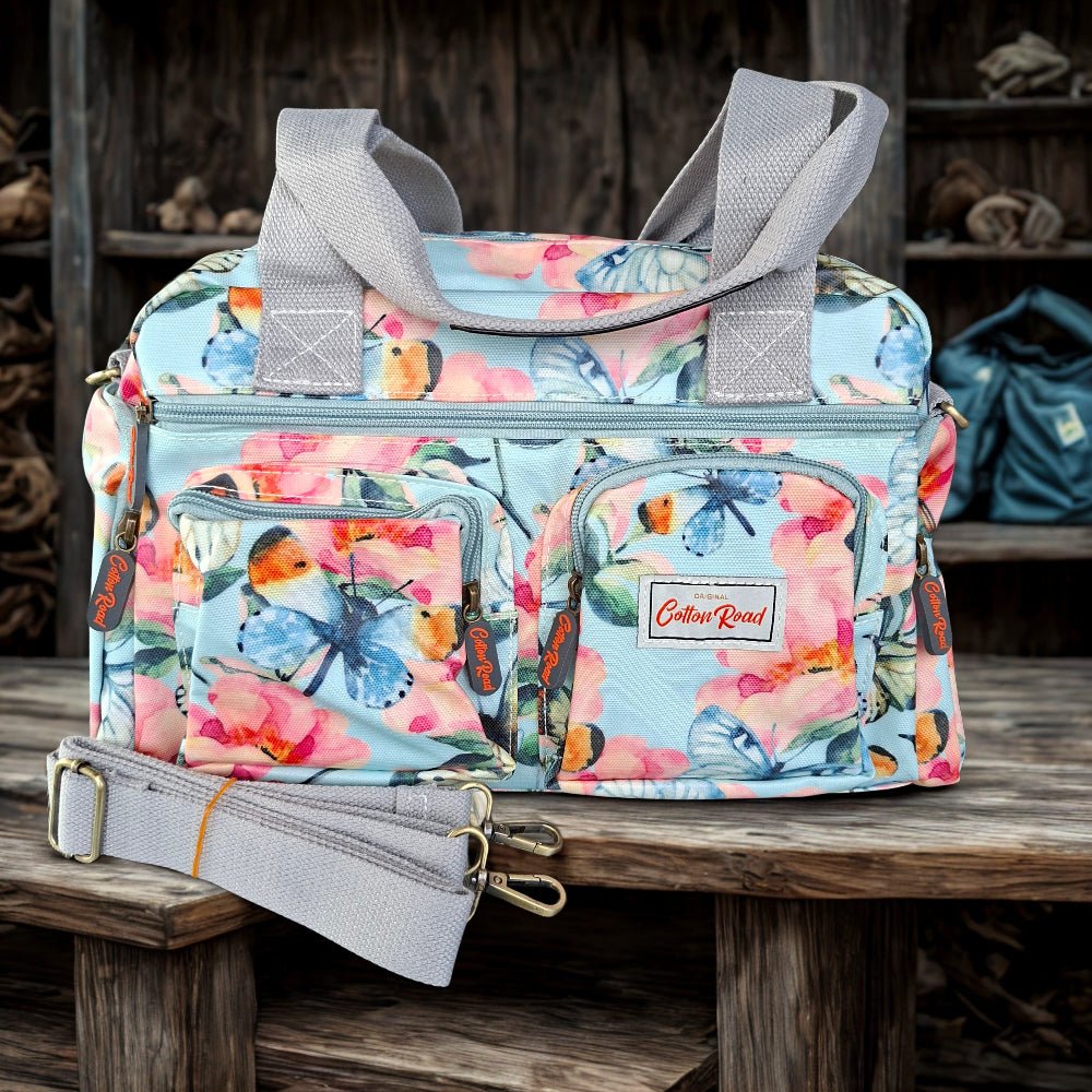 Cotton Road Handbag: LIGHT BLUE PVC with FLORAL and BUTTERFLY Print