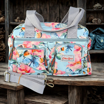 Cotton Road Handbag: LIGHT BLUE PVC with FLORAL and BUTTERFLY Print