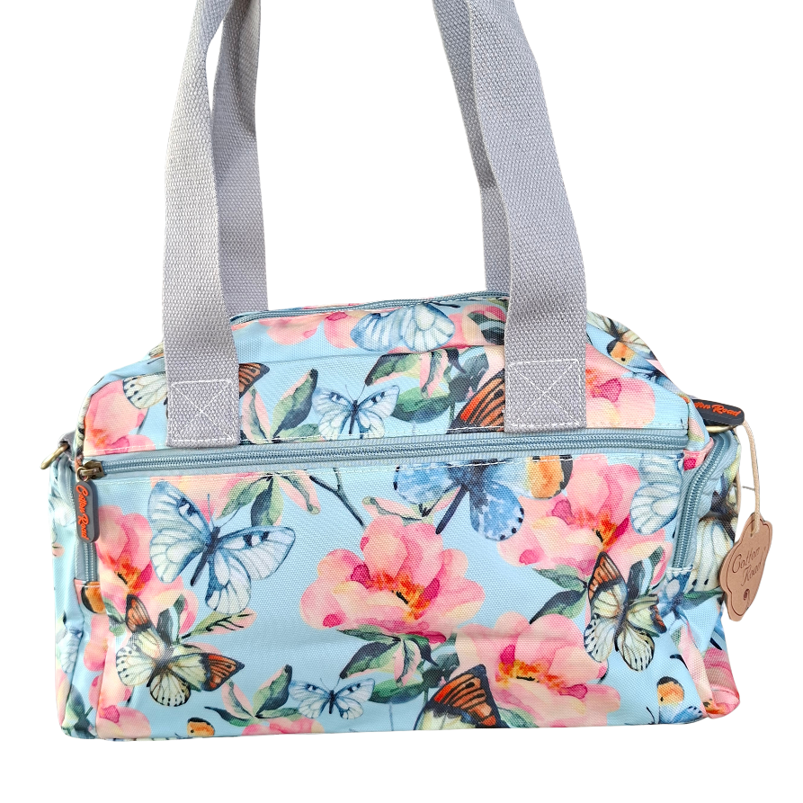 Cotton Road Handbag: LIGHT BLUE PVC with FLORAL and BUTTERFLY Print CARRY BACK VIEW