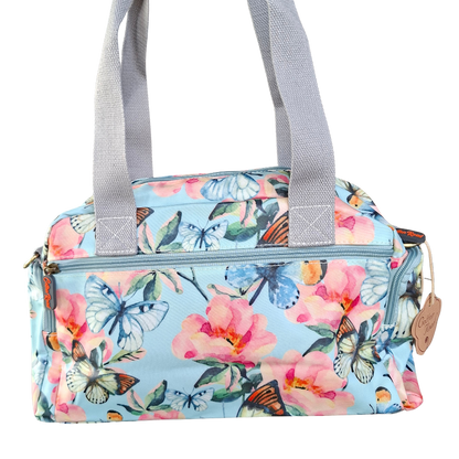 Cotton Road Handbag: LIGHT BLUE PVC with FLORAL and BUTTERFLY Print CARRY BACK VIEW