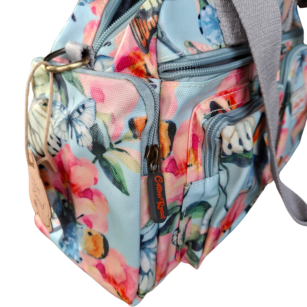 Cotton Road Handbag: LIGHT BLUE PVC with FLORAL and BUTTERFLY Print CARRY SIDE