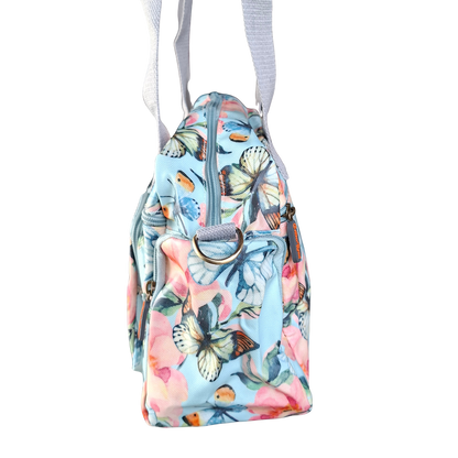 Cotton Road Handbag: LIGHT BLUE PVC with FLORAL and BUTTERFLY Print CARRY SIDE HANGING VIEW