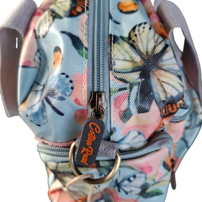 Cotton Road Handbag: LIGHT BLUE PVC with FLORAL and BUTTERFLY Print CARRY TOP ZIP
