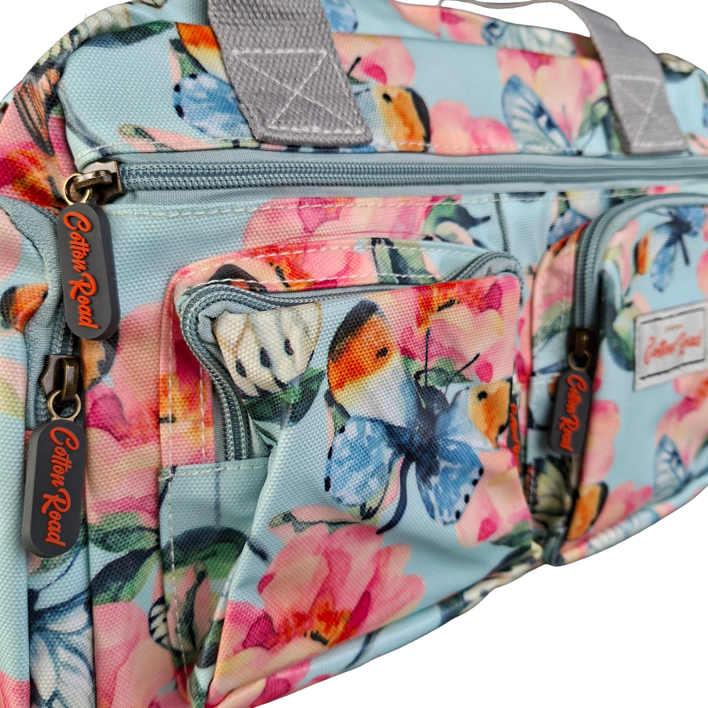 Cotton Road Handbag: LIGHT BLUE PVC with FLORAL and BUTTERFLY Print CARRY ZOOM VIEW