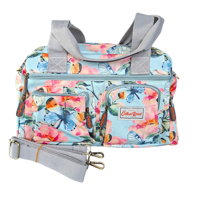 Cotton Road Handbag: LIGHT BLUE PVC with FLORAL and BUTTERFLY Print FRONT
