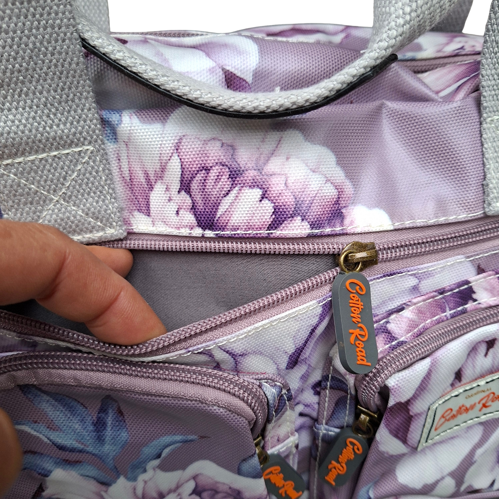 Cotton Road Handbag: PURPLE PVC with FLORAL Print POCKET VIEW