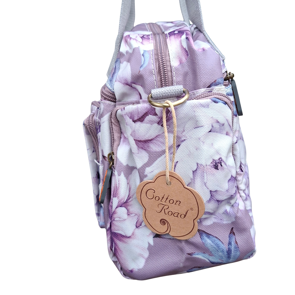Cotton Road Handbag: PURPLE PVC with FLORAL Print SIDE VIEW