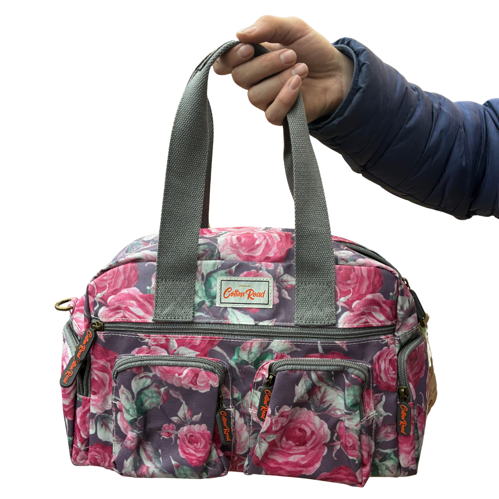 Cotton Road Handbag: Purple PVC with pink roses Print FRONT