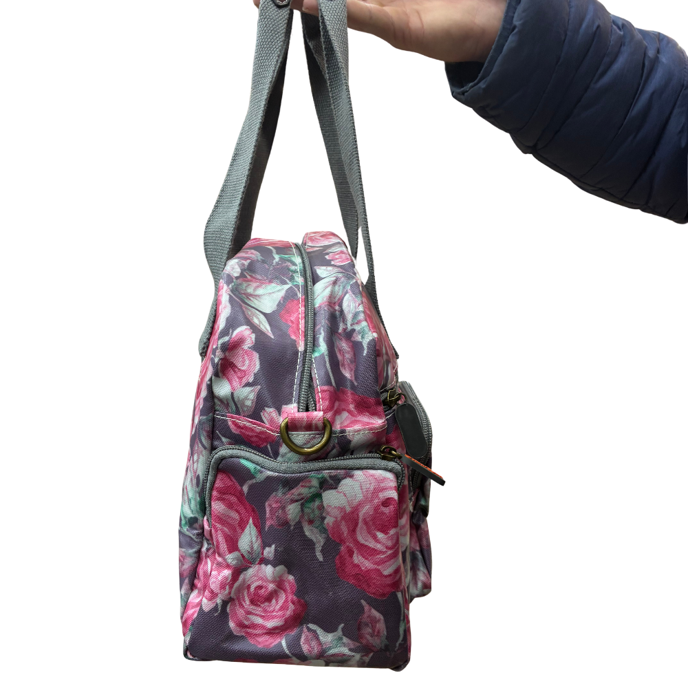 Cotton Road Handbag: Purple PVC with pink roses Print SIDE VIEW