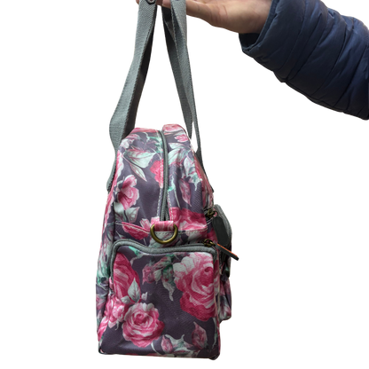 Cotton Road Handbag: Purple PVC with pink roses Print SIDE VIEW