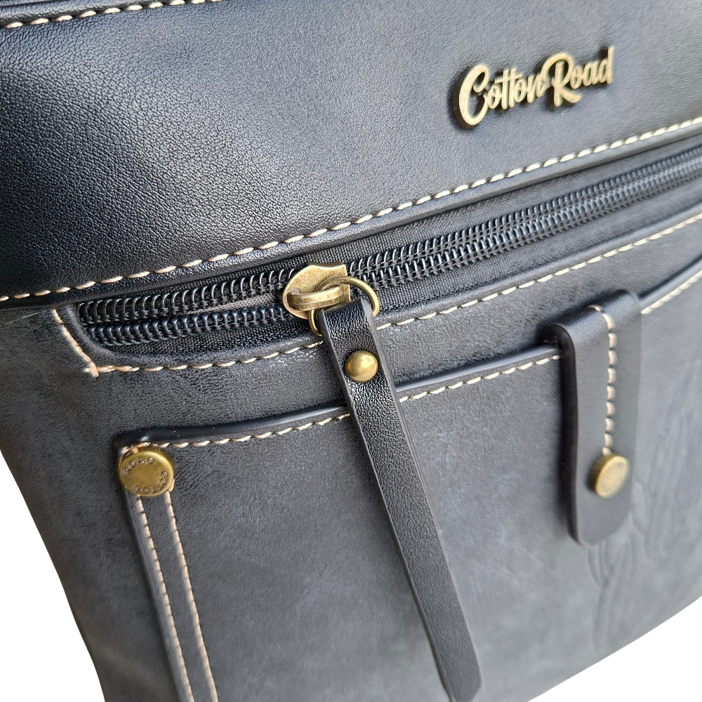 Cotton Road Sling Bag: BLACK PU Leather with Embossed Protea zoom view